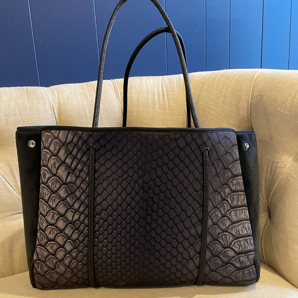 Haute Shore skin print neoprene bag.